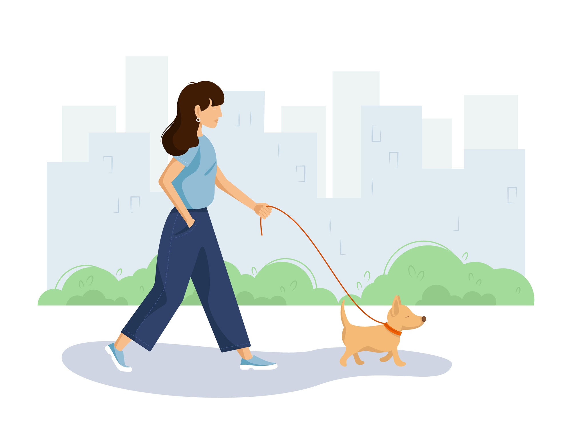 A woman walking a dog in a park.